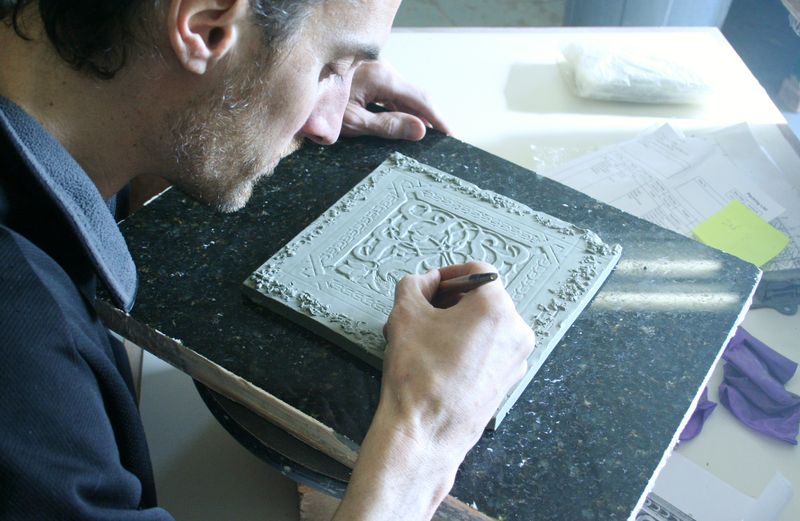 Carving a relief tile master by hand